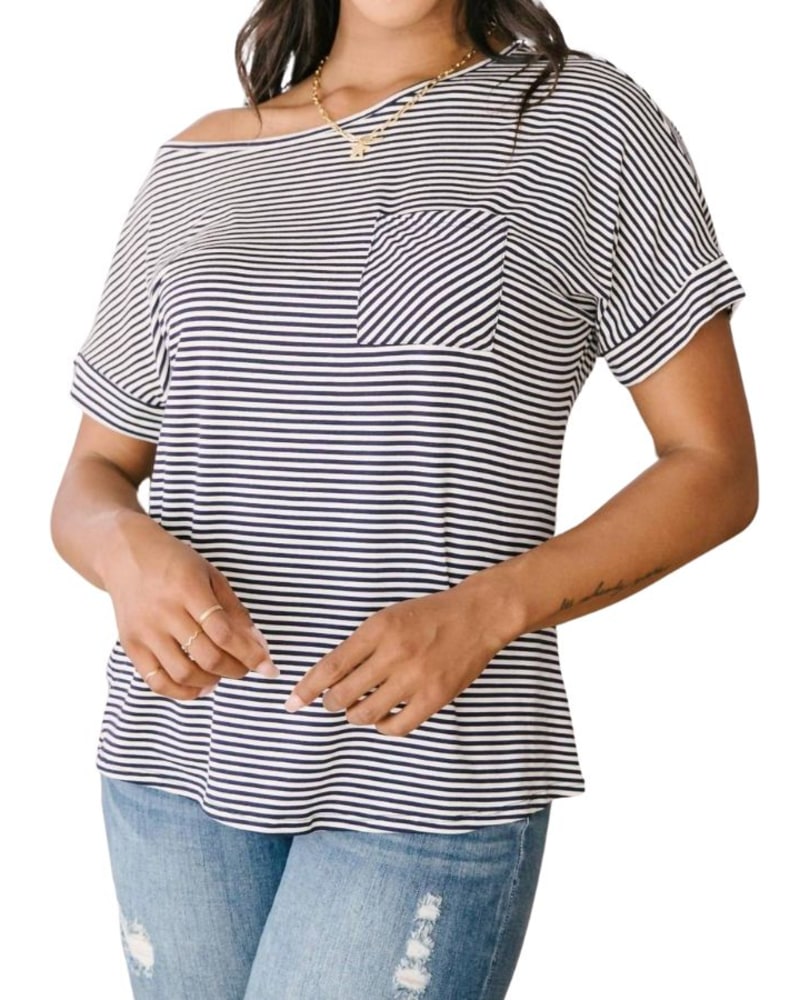 Front of a model wearing a size XL The Boardwalk Top in Navy in Navy by 1clique co.. | dia_product_style_image_id:360703